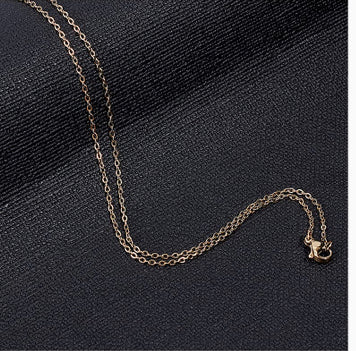 Collana bottone Versace